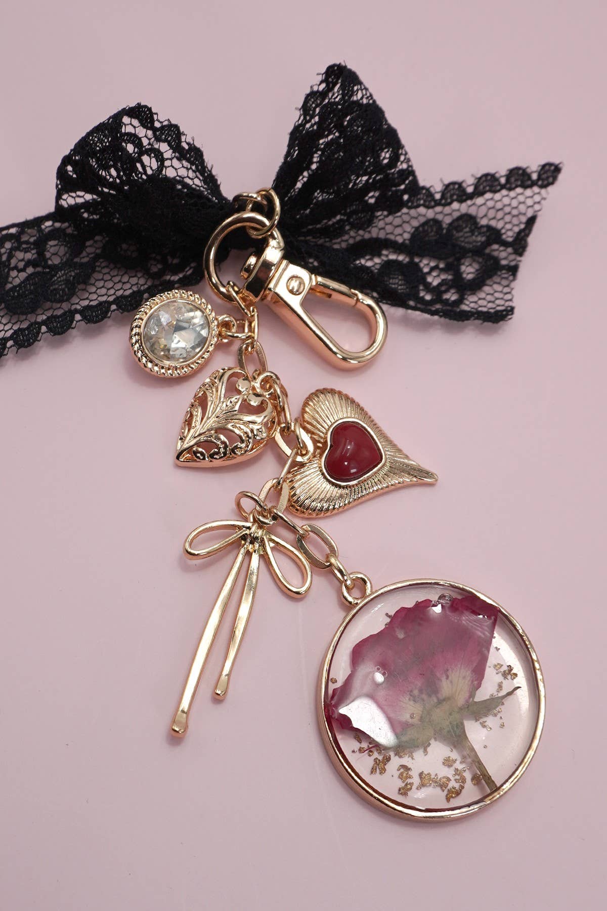 BAG CHARM-DRIED FLOWER BOW HEART RHINESTONE | 80K037
